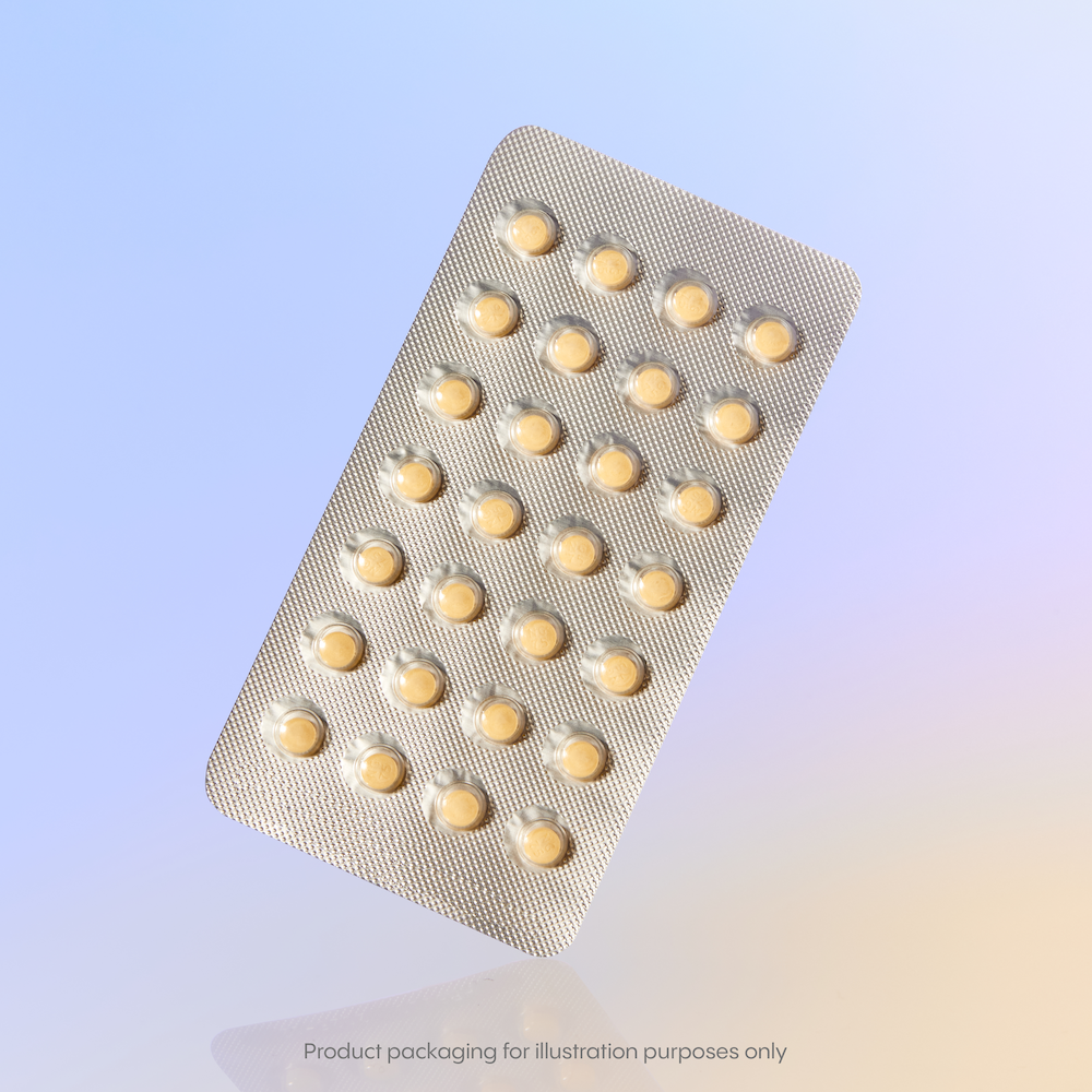 A blister pack containing 28 round Norethindrone pills rests on a gradient background.