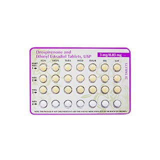 A blister pack of 28 tablets labeled as Drospirenone and Ethinyl Estradiol, with days of the week marked for each row.