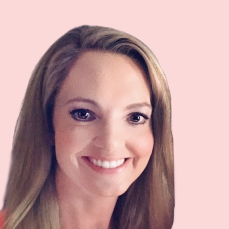 A woman with long, straight hair smiles against a light pink background.
