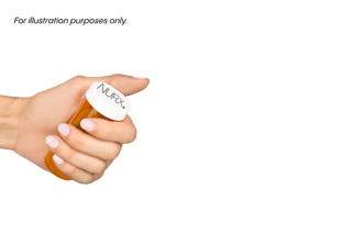 A hand holding a prescription pill bottle labeled 