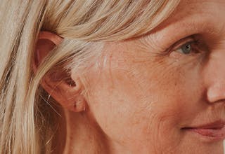 Middle aged women looking off in distance