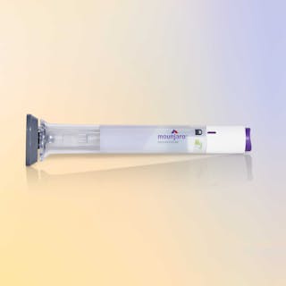 Mounjaro GLP1 injectable pen against a gradient background
