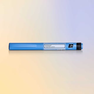 Victoza GLP1 injectable pen against a gradient background