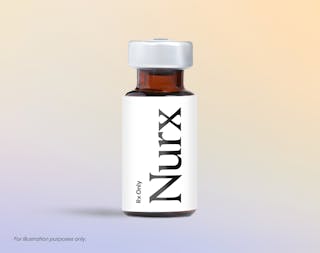 A small amber prescription vial labeled 