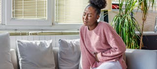 Image illustrating 'What does anxiety stomach pain feel like?'